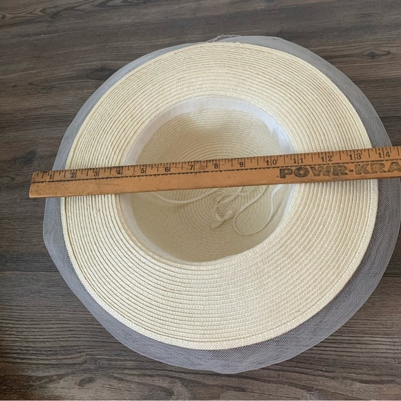 Elegant Cream Wide-Brim Hat with Floral Accent - Picture 8 of 9